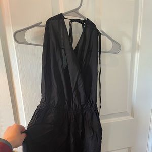 Learning to fly black halter jumpsuit